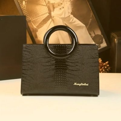 Black crocodile patterned bag